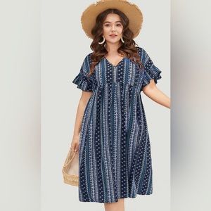 Bohemian Bandanna print w/dolman sleeves with ruffles. Deep-V neck and pockets!